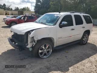 2011 Chevrolet Tahoe LTZ с VIN 1GNSKCE07BR235983, выставлен на аукционе Copart как лот 72083715 с пробегом 131 532 миль миль и Списание • Salvage title. История ставок и продаж доступна на DreamBid. Изображение 1.