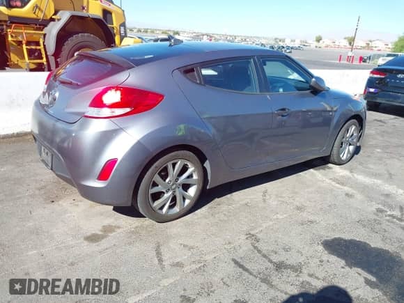 2016 Hyundai Veloster with VIN KMHTC6AD3GU276972, listed as a IAAI auction lot 43544262 with 93,089 mi miles and . Bid and sale history available at DreamBid. Image 4.