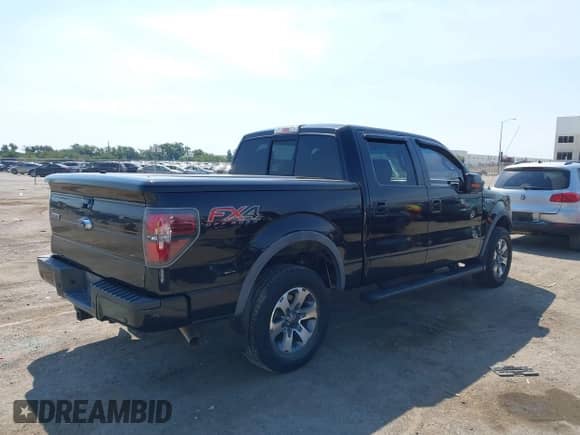 2014 Ford F-150 XLT with VIN 1FTFW1E64EFD14542, listed as a IAAI auction lot 43034880 with 197,620 mi miles and . Bid and sale history available at DreamBid. Image 4.