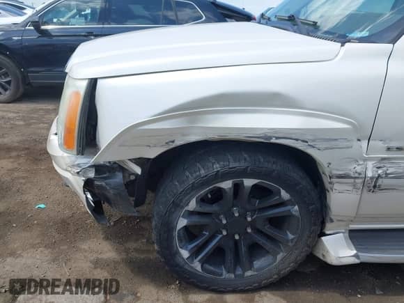 2004 Cadillac Escalade with VIN 1GYEC63T54R235754, listed as a IAAI auction lot 43121128 with 105,629 mi miles and . Bid and sale history available at DreamBid. Image 6.