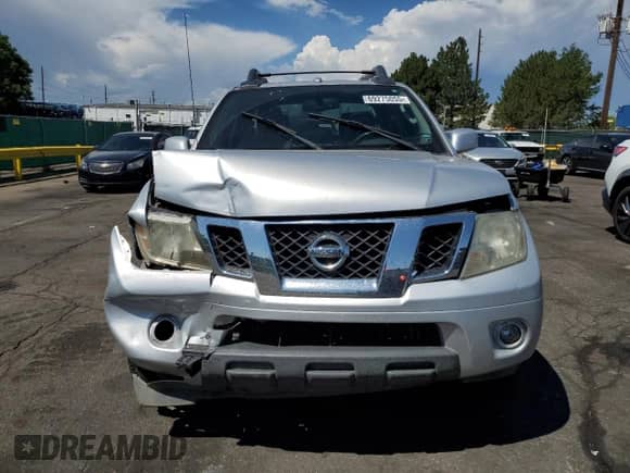 2011 Nissan Frontier Pro-4X z VIN 1N6AD0EV6BC421622, wystawiony jako Copart lot #69275055 z przebiegiem 186 855 mil mil oraz Szkoda całkowita • Salvage title. Historia ofert i sprzedaży dostępna na DreamBid. Obrazek 5.