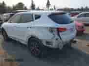 2014 Hyundai Santa Fe z VIN 5XYZU3LA3EG126890, wystawiony jako IAAI lot #42974858 z przebiegiem 103 129 mil mil oraz . Historia ofert i sprzedaży dostępna na DreamBid. Obrazek 3.