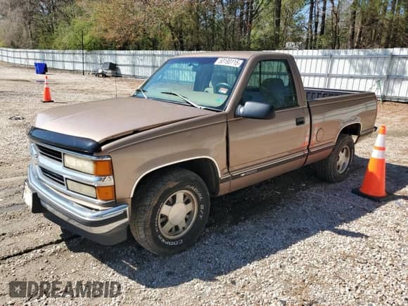 1997 Chevrolet Silverado 1500 with VIN 1GCEC14R4VZ211975, listed as a Copart auction lot 50190115 with 132,978 mi miles and Salvage title. Bid and sale history available at DreamBid. Image 1.