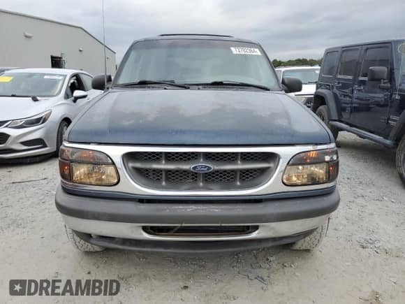 1998 Ford Explorer XLT с VIN 1FMZU32P0WUD21265, выставлен на аукционе Copart как лот 73702364 с пробегом 211 096 миль миль и Списание • Salvage title. История ставок и продаж доступна на DreamBid. Изображение 5.
