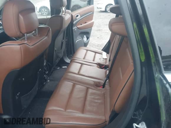 2015 Jeep Grand Cherokee Summit z VIN 1C4RJFJM7FC236998, wystawiony jako IAAI lot #43391148 z przebiegiem 173 967 mil mil oraz . Historia ofert i sprzedaży dostępna na DreamBid. Obrazek 8.