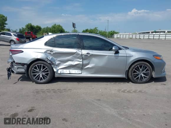 2021 Toyota Camry Hybrid XLE with VIN 4T1F31AK5MU565376, listed as a IAAI auction lot 42687616 with 57,880 mi miles and . Bid and sale history available at DreamBid. Image 13.