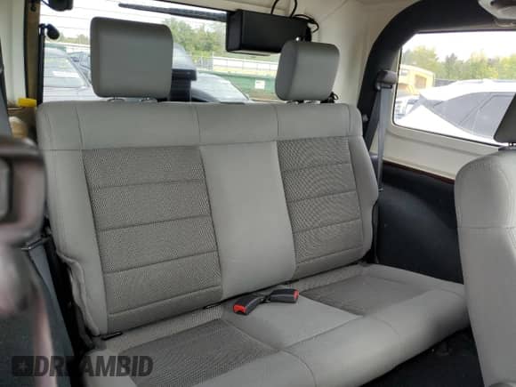 2008 Jeep Wrangler Sahara с VIN 1J4FA54138L641400, выставлен на аукционе Copart как лот 80331605 с пробегом 130 443 миль миль и Чистый • Clean title. История ставок и продаж доступна на DreamBid. Изображение 11.