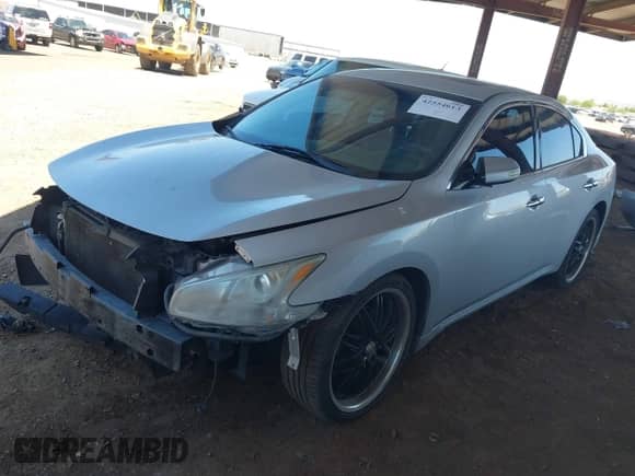 2014 Nissan Maxima SV with VIN 1N4AA5APXEC475581, listed as a IAAI auction lot 42554613 with 156,412 mi miles and . Bid and sale history available at DreamBid. Image 13.