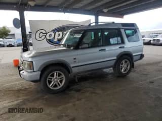2003 Land Rover Discovery SE с VIN SALTY16443A824998, выставлен на аукционе Copart как лот 86298865 с пробегом 149 504 миль миль и Чистый • Clean title. История ставок и продаж доступна на DreamBid. Изображение 1.