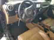 2011 Jeep Wrangler Rubicon with VIN 1J4BA6D14BL500914, listed as a Copart auction lot 67012985 with 124,873 mi miles and Salvage title. Bid and sale history available at DreamBid. Image 8.