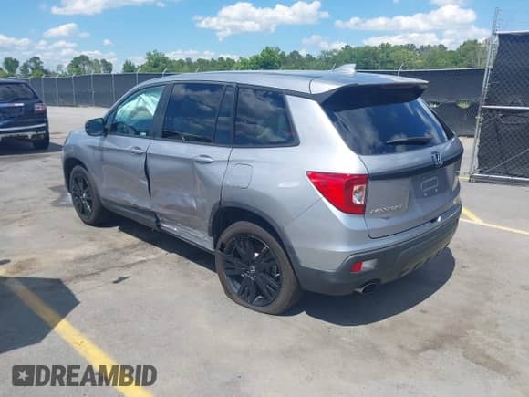 2021 Honda Passport Sport z VIN 5FNYF7H27MB003467, wystawiony jako IAAI lot #42183219 z przebiegiem 52 156 mil mil oraz . Historia ofert i sprzedaży dostępna na DreamBid. Obrazek 3.