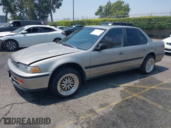 1992 Honda Accord with VIN JHMCB7676NC061474, listed as a IAAI auction lot 42734123 with 179,016 mi miles and . Bid and sale history available at DreamBid. Image 19.