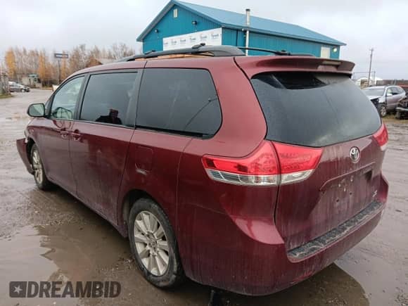 2014 Toyota Sienna LE with VIN 5TDJK3DC8ES083704, listed as a Copart auction lot 84932195 with 210,428 mi miles and Salvage title. Bid and sale history available at DreamBid. Image 2.