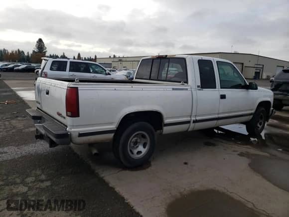 1997 GMC Sierra 1500 z VIN 2GTEC19R8V1523041, wystawiony jako Copart lot #52215125 z przebiegiem 207 461 mil mil oraz Szkoda całkowita • Salvage title. Historia ofert i sprzedaży dostępna na DreamBid. Obrazek 3.
