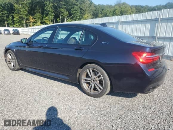 2018 BMW 7 Series 740e xDrive z VIN WBA7J2C52JG938439, wystawiony jako Copart lot #69452044 z przebiegiem 38 451 mil mil oraz Szkoda całkowita • Salvage title. Historia ofert i sprzedaży dostępna na DreamBid. Obrazek 2.