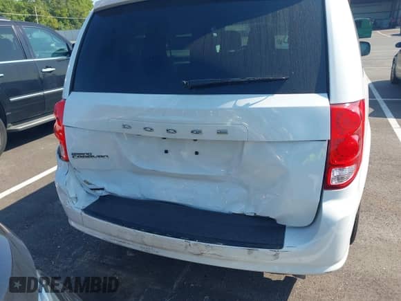 2018 Dodge Grand Caravan SE with VIN 2C4RDGBG0JR160059, listed as a IAAI auction lot 42947297 with 55,046 mi miles and . Bid and sale history available at DreamBid. Image 16.