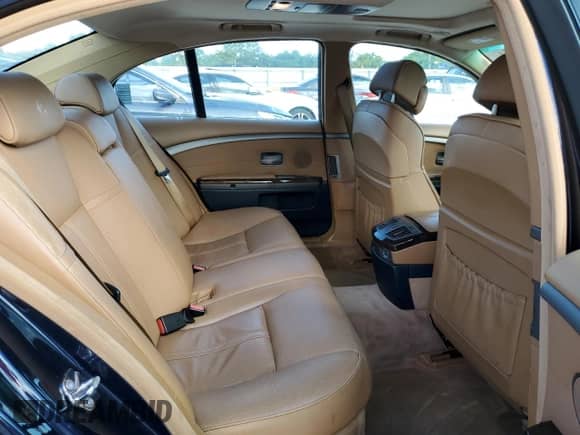 2005 BMW 7 Series 745i z VIN WBAGL63545DP75494, wystawiony jako Copart lot #72359904 z przebiegiem 143 878 mil mil oraz Szkoda całkowita • Salvage title. Historia ofert i sprzedaży dostępna na DreamBid. Obrazek 10.