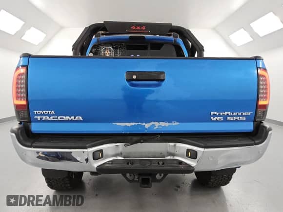 2005 Toyota Tacoma PreRunner with VIN 3TMJU62N05M002100, listed as a Copart auction lot 84837805 with 300,227 mi miles and Clean title. Bid and sale history available at DreamBid. Image 6.