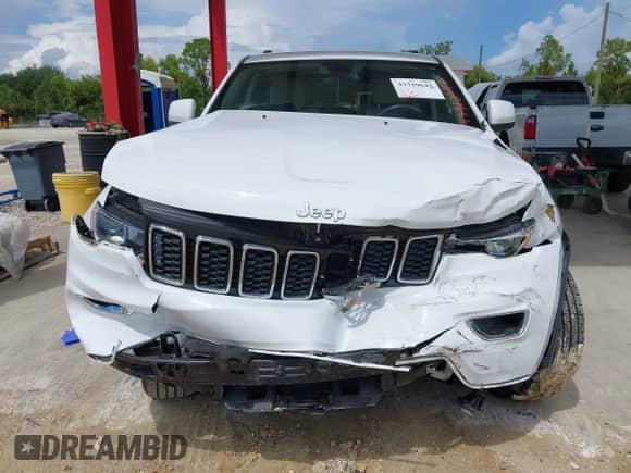 2020 Jeep Grand Cherokee Laredo E with VIN 1C4RJEAG5LC392277, listed as a IAAI auction lot 43310642 with 34,267 mi miles and . Bid and sale history available at DreamBid. Image 12.