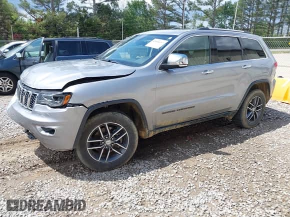 2017 Jeep Grand Cherokee Limited with VIN 1C4RJEBG4HC765329, listed as a IAAI auction lot 42008297 with 194,607 mi miles and . Bid and sale history available at DreamBid. Image 2.