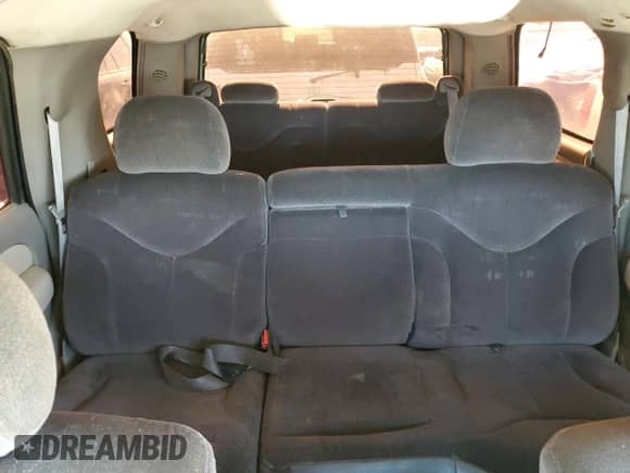 2001 Chevrolet Tahoe LS with VIN 1GNEC13T01R199886, listed as a Copart auction lot 64245125 with 242,201 mi miles and Salvage title. Bid and sale history available at DreamBid. Image 10.