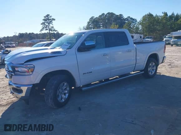 2020 Ram 1500 Laramie with VIN 1C6SRFRT3LN231617, listed as a IAAI auction lot 41280899 with 38,843 mi miles and . Bid and sale history available at DreamBid. Image 2.