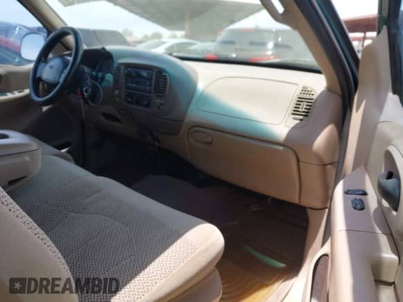 1999 Ford F-150 XL with VIN 1FTRX17L5XKA29212, listed as a IAAI auction lot 42359916 with 131,137 mi miles and . Bid and sale history available at DreamBid. Image 5.