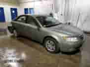 2010 Hyundai Sonata Limited z VIN 5NPEU4AC0AH659016, wystawiony jako Copart lot #84516034 z przebiegiem 165 186 mil mil oraz Szkoda całkowita • Salvage title. Historia ofert i sprzedaży dostępna na DreamBid. Obrazek 4.