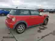 2012 MINI Hardtop with VIN WMWSU3C56CT261218, listed as a Copart auction lot 60810455 with 60,770 mi miles and Salvage title. Bid and sale history available at DreamBid. Image 3.