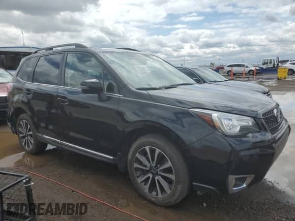 2017 Subaru Forester Touring z VIN JF2SJGWC2HH432961, wystawiony jako Copart lot #59044165 z przebiegiem 58 716 mil mil oraz Szkoda całkowita • Salvage title. Historia ofert i sprzedaży dostępna na DreamBid. Obrazek 4.
