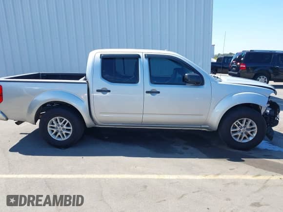 2018 Nissan Frontier SV z VIN 1N6AD0ER6JN742419, wystawiony jako IAAI lot #43183517 z przebiegiem 233 517 mil mil oraz . Historia ofert i sprzedaży dostępna na DreamBid. Obrazek 14.