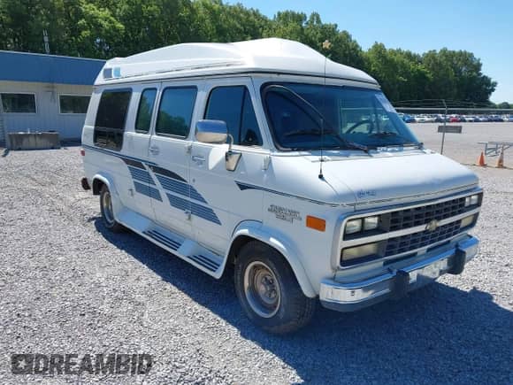 1993 Chevrolet Chevy Van z VIN 1GBEG25K5PF330218, wystawiony jako IAAI lot #42321737 z przebiegiem 203 157 mil mil oraz . Historia ofert i sprzedaży dostępna na DreamBid. Obrazek 6.