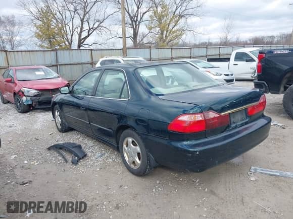 2000 Honda Accord EX with VIN JHMCG5659YC001925, listed as a IAAI auction lot 41715654 with 190,605 mi miles and . Bid and sale history available at DreamBid. Image 3.