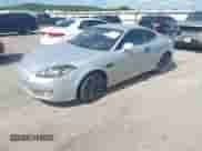 2008 Hyundai Tiburon GS с VIN KMHHM66D98U292719, выставлен на аукционе IAAI как лот 42559802 с пробегом 139 376 миль миль и . История ставок и продаж доступна на DreamBid. Изображение 2.