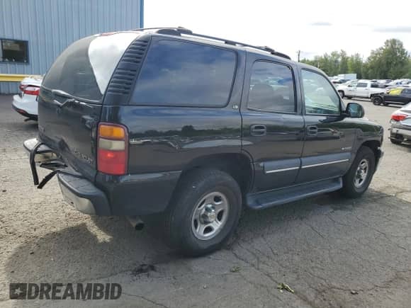 2002 Chevrolet Tahoe LS z VIN 1GNEC13V32R219860, wystawiony jako Copart lot #65943085 z przebiegiem 221 470 mil mil oraz Szkoda całkowita • Salvage title. Historia ofert i sprzedaży dostępna na DreamBid. Obrazek 3.
