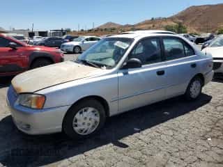 2002 Hyundai Accent GL с VIN KMHCG45C92U353198, выставлен на аукционе Copart как лот 68305654 с пробегом 130 594 миль миль и Чистый • Clean title. История ставок и продаж доступна на DreamBid. Изображение 1.