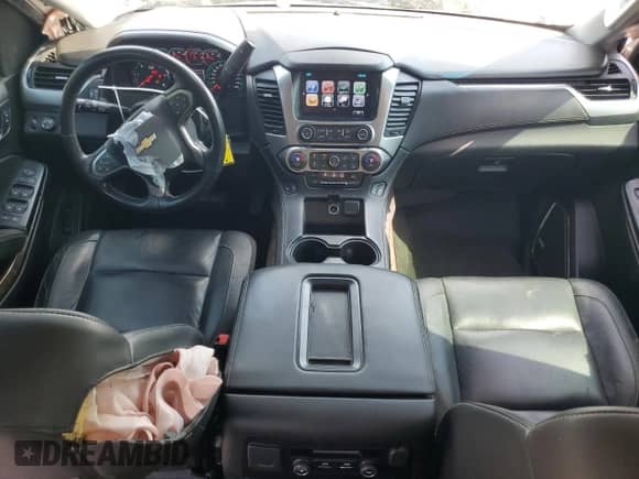 2018 Chevrolet Suburban LT with VIN 1GNSCHKC9JR237158, listed as a Copart auction lot 83975075 with 142,981 mi miles and Salvage title. Bid and sale history available at DreamBid. Image 8.