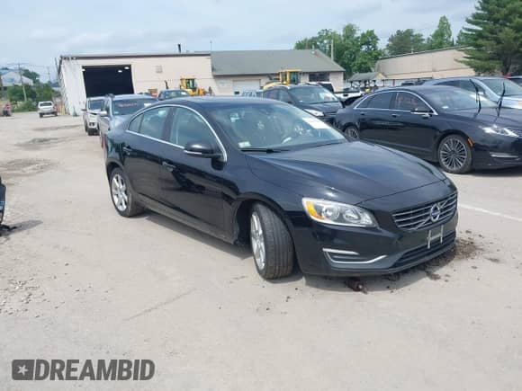2016 Volvo S60 T5 Drive-E Premier z VIN YV126MFKXG2390847, wystawiony jako IAAI lot #42647884 z przebiegiem 115 397 mil mil oraz . Historia ofert i sprzedaży dostępna na DreamBid. Obrazek 1.
