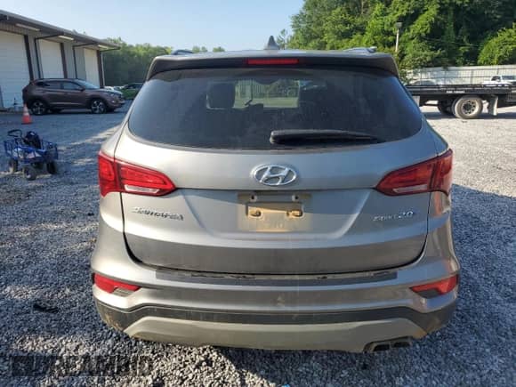 2018 Hyundai Santa Fe 2.0T с VIN 5NMZU4LA5JH086141, выставлен на аукционе Copart как лот 59622905 с пробегом 145 515 миль миль и Списание • Salvage title. История ставок и продаж доступна на DreamBid. Изображение 6.