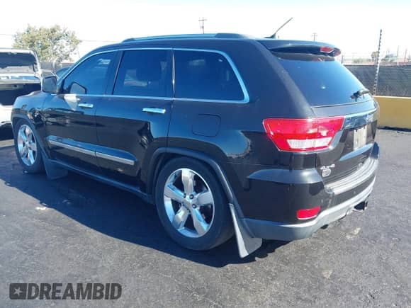 2012 Jeep Grand Cherokee Overland Summit z VIN 1C4RJFCT0CC279563, wystawiony jako IAAI lot #43536876 z przebiegiem 172 943 mil mil oraz . Historia ofert i sprzedaży dostępna na DreamBid. Obrazek 3.