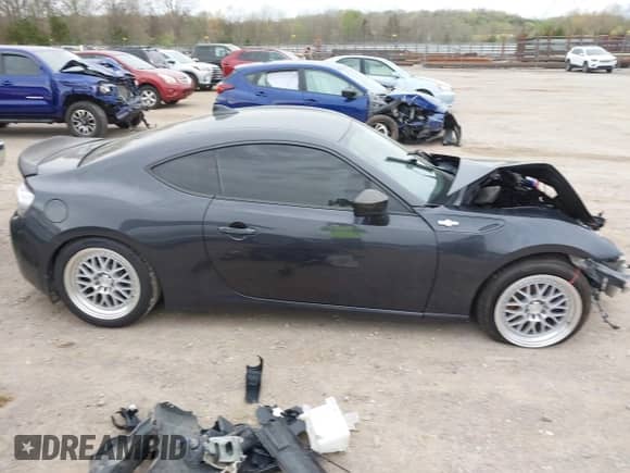 2015 Scion FR-S z VIN JF1ZNAA10F9701637, wystawiony jako IAAI lot #41912045 z przebiegiem Nie podano mil oraz . Historia ofert i sprzedaży dostępna na DreamBid. Obrazek 13.