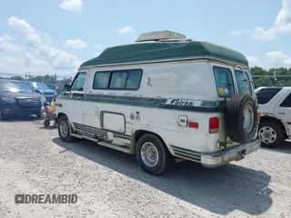 1990 Chevrolet Chevy Van with VIN 1GBEG25KXL7110285, listed as a IAAI auction lot 42875782 with 235,828 mi miles and . Bid and sale history available at DreamBid. Image 3.