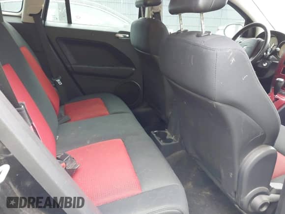 2009 Dodge Caliber SXT with VIN 1B3HB48A29D180283, listed as a IAAI auction lot 42875302 with 133,945 mi miles and . Bid and sale history available at DreamBid. Image 8.