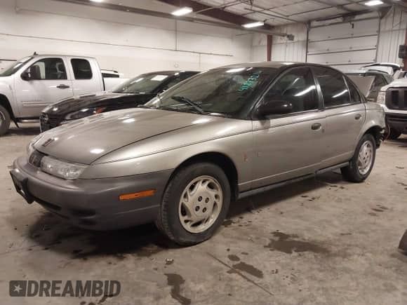 1997 Saturn SL with VIN 1G8ZH5280VZ172929, listed as a IAAI auction lot 41273214 with 134,972 mi miles and . Bid and sale history available at DreamBid. Image 20.