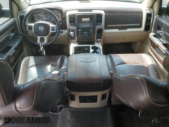 2014 Ram 1500 Longhorn z VIN 1C6RR7PTXES479469, wystawiony jako Copart lot #67517725 z przebiegiem 189 231 mil mil oraz Szkoda całkowita • Salvage title. Historia ofert i sprzedaży dostępna na DreamBid. Obrazek 8.