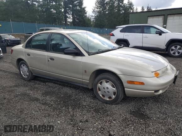 2001 Saturn SL with VIN 1G8ZG52851Z213567, listed as a Copart auction lot 51795795 with Not provided miles and Salvage title. Bid and sale history available at DreamBid. Image 4.