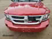 2009 Dodge Dakota Bighorn/Lonestar z VIN 1D7HW38P19S778173, wystawiony jako Copart lot #51582035 z przebiegiem 43 544 mil mil oraz Szkoda całkowita • Salvage title. Historia ofert i sprzedaży dostępna na DreamBid. Obrazek 12.