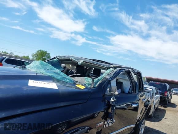 2015 Ram 1500 Laramie Limited with VIN 1C6RR7PT5FS552426, listed as a IAAI auction lot 42039997 with 167,944 mi miles and . Bid and sale history available at DreamBid. Image 6.