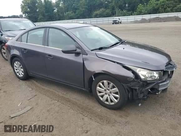 2011 Chevrolet Cruze 1LT z VIN 1G1PF5S9XB7111289, wystawiony jako Copart lot #66905785 z przebiegiem 107 249 mil mil oraz Szkoda całkowita • Salvage title. Historia ofert i sprzedaży dostępna na DreamBid. Obrazek 4.