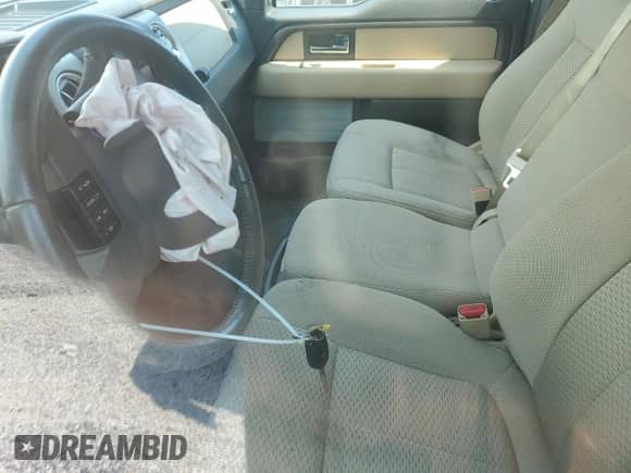 2014 Ford F-150 XL с VIN 1FTFW1CTXEFC18133, выставлен на аукционе Copart как лот 69437295 с пробегом 111 804 миль миль и Списание • Salvage title. История ставок и продаж доступна на DreamBid. Изображение 7.